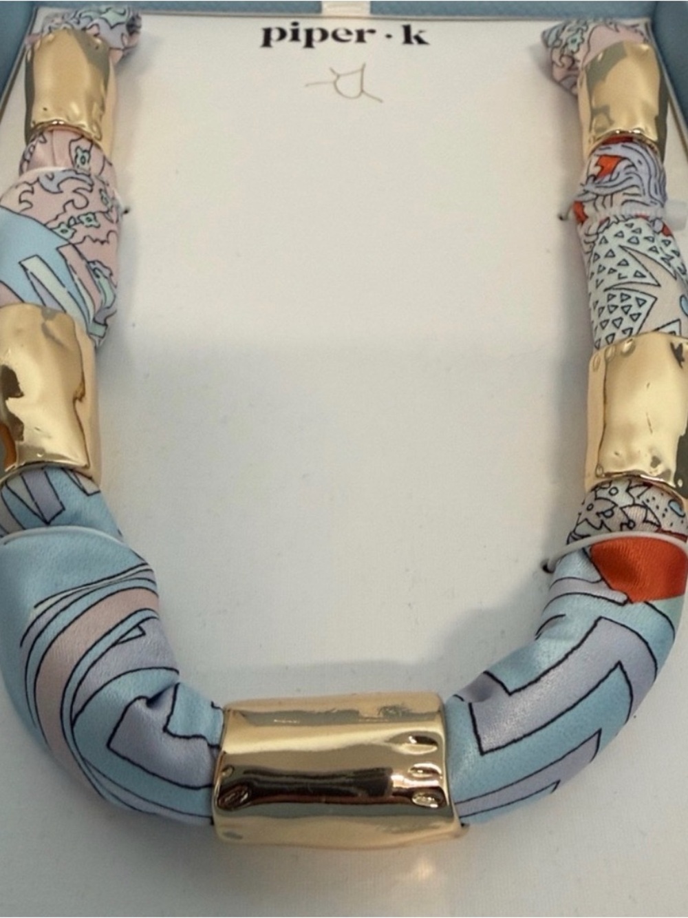 Piper K Pastel Blue and Gold Printed Silk Tube Necklace - Picture 3 of 5